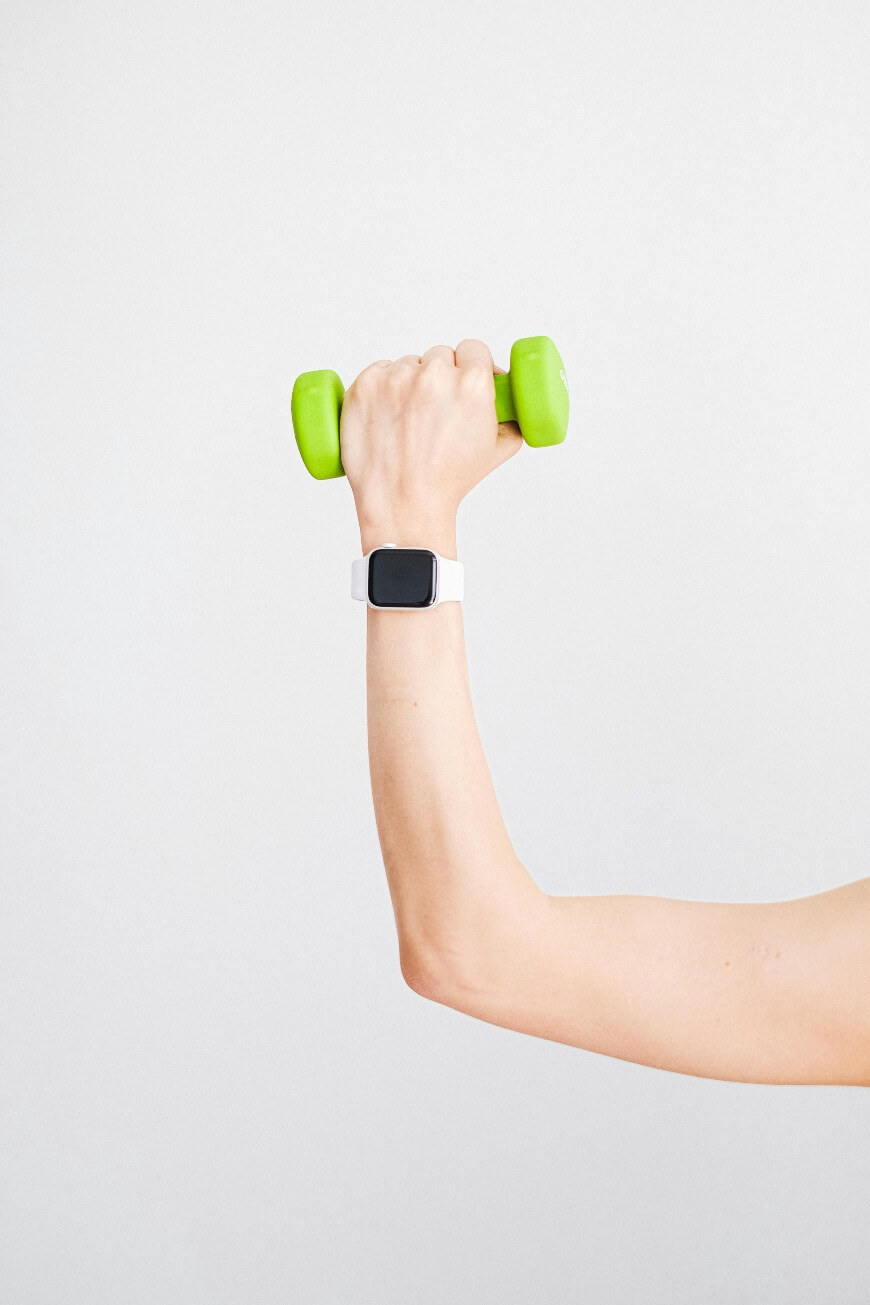holding a dumbbell
