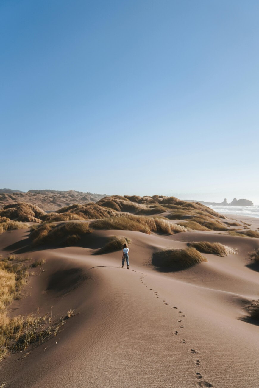 girl walking in desert alone