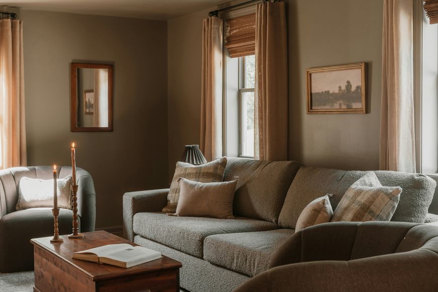Cozy living room with a sofa and armchair